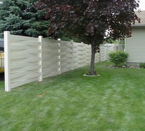 vinyl fencing Omaha, Nebraska residential fence contractors Omaha fence company woven fence boards horizontal alternating pickets planks cedar vinyl