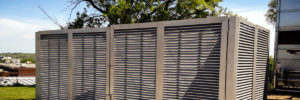 Omaha fence company commercial fence contractors Nebraska architectural mechanical screening screen louvered semi private private solid staggered board on board shadow box alternatinglouvers rooftop louvers chillers generators truck wells outside storage condensors rooftop equipment patios trash dumpsters transformers HVAC courtyards pool equipment fence aluminum galvanized steel degree of openness direct visibility standalone wall louvers